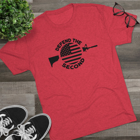 Red shirt displaying American flag over rifle image and defend the second text